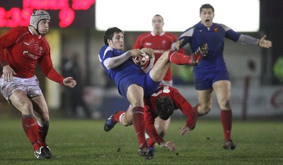 14.03.08 ..  Wales U20 v France U20, U20 Six Nations, Newport -  France's Julien Dumora is upended by Wales' Gareth Owen 