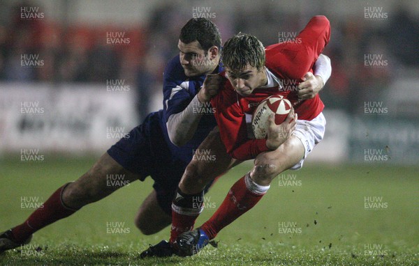 14.03.08 ..  Wales U20 v France U20, U20 Six Nations, Newport -  Wales' Gareth Owen is tackled by France's Yohann Vivalda  