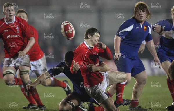 14.03.08 ..  Wales U20 v France U20, U20 Six Nations, Newport -  Wales' Daniel Biggar loses the ball as he's brought down  