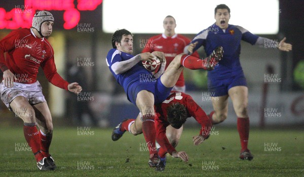 14.03.08 ..  Wales U20 v France U20, U20 Six Nations, Newport -  France's Julien Dumora is upended by Wales' Gareth Owen 