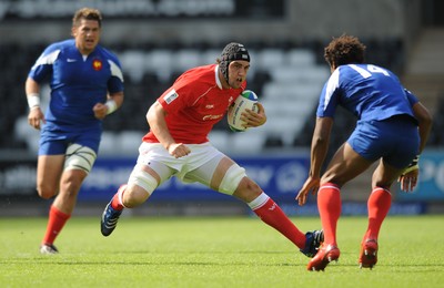 14.06.08 - Wales Under 20s v France Under 20s - Junior World Championship 2008 - Wales' Josh Turnbull takes on France's Benjamin Fall. 