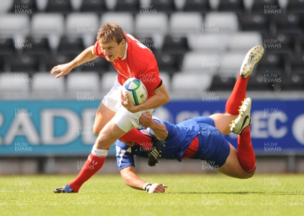 14.06.08 - Wales Under 20s v France Under 20s - Junior World Championship 2008 - Wales' Dan Biggar is tackled by France's Louis Madaule. 