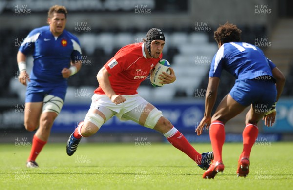14.06.08 - Wales Under 20s v France Under 20s - Junior World Championship 2008 - Wales' Josh Turnbull takes on France's Benjamin Fall. 