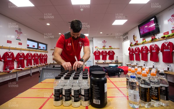 210220 - Wales U20 v France U20, U20 Six Nations Championship - Nutritionist Chris Edwards prepares the Wales U20 players match supplements ready for the arrival of the players
