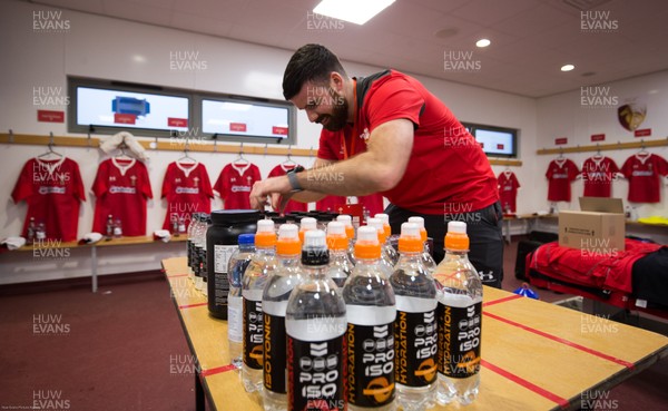 210220 - Wales U20 v France U20, U20 Six Nations Championship - Nutritionist Chris Edwards prepares the Wales U20 players match supplements ready for the arrival of the players