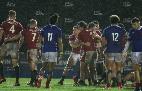 210220 - Wales U20 v France U20, U20 Six Nations Championship - Wales players celebrate after Morgan Strong of Wales scores the second try