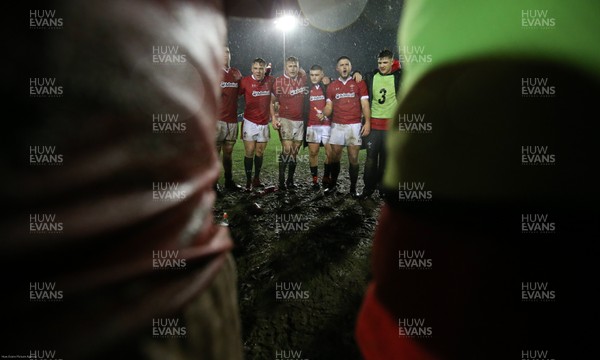 210220 - Wales U20 v France U20, U20 Six Nations Championship - The Welsh team huddle together at the end of the match
