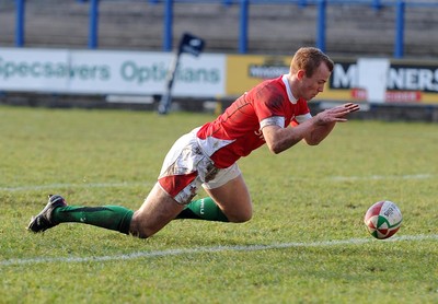 26.02.10 - Six Nations Under 20 Championship, Wales Under 20 v France Under 20 Wales' Dan Fish dives on the ball to score a try 