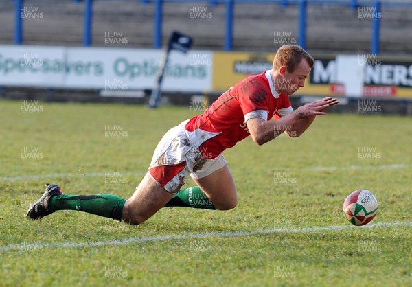 26.02.10 - Six Nations Under 20 Championship, Wales Under 20 v France Under 20 Wales' Dan Fish dives on the ball to score a try 