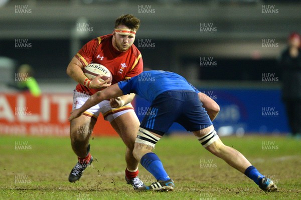 270216 - Wales Under 20 v France Under 20 - Under 20 Six Nations 2016 -Dillon Lewis of Wales is tackled by Anthony Jelonch of France