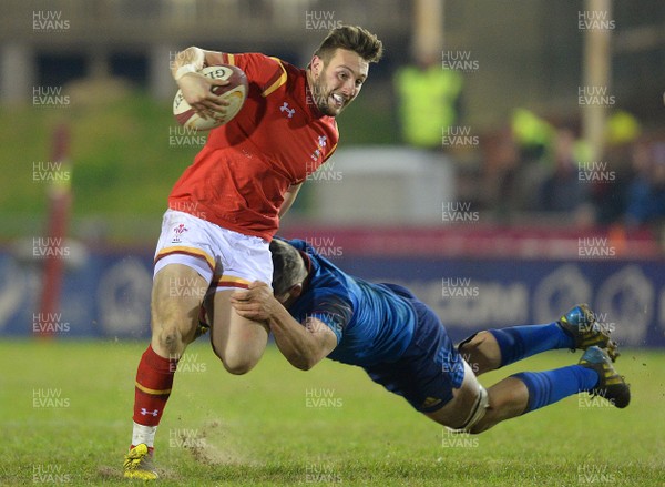 270216 - Wales Under 20 v France Under 20 - Under 20 Six Nations 2016 -Billy McBryde of Wales is tackled by Baptiste Pesanti of France