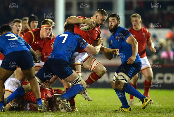 270216 - Wales Under 20 v France Under 20 - Under 20 Six Nations 2016 -Harrison Keddie of Wales is tackled by Anthony Jelonch of France