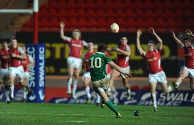 11.03.11 - Wales Under 20 v Ireland Under 20 - Under 20 Six Nations - Wales players attempt to charge down a conversion by Paddy Jackson of Ireland at the end of the game. 