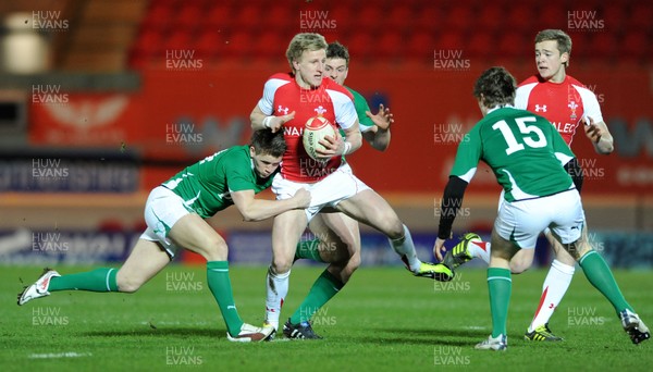 11.03.11 - Wales Under 20 v Ireland Under 20 - Under 20 Six Nations - Ben John of Wales takes on Craig Gilroy of Ireland. 