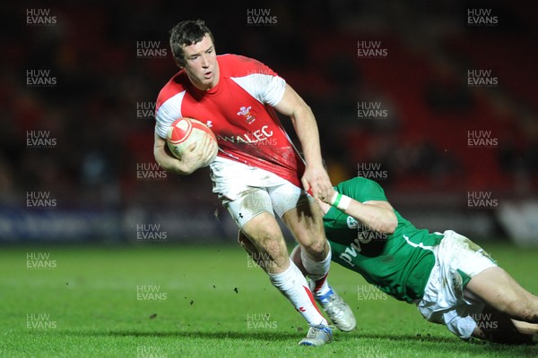 11.03.11 - Wales Under 20 v Ireland Under 20 - Under 20 Six Nations - Adam Warren of Wales takes on Craig Gilroy of Ireland. 