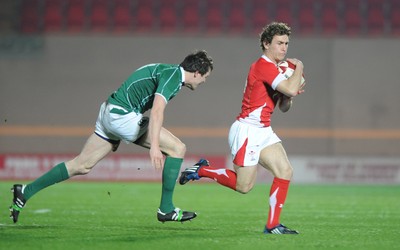 20.03.09 - Wales Under 20 v Ireland Under 20 - Under 20 Six Nations 2009 - Wales' James Loxton tries to get past Eamonn Sheridan. 