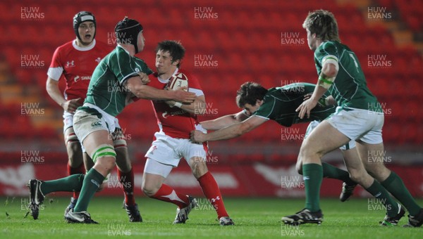 20.03.09 - Wales Under 20 v Ireland Under 20 - Under 20 Six Nations 2009 - Wales' Dai Langdon is held by the Irish defence. 