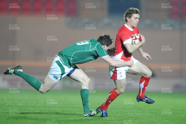 20.03.09 - Wales Under 20 v Ireland Under 20 - Under 20 Six Nations 2009 - Wales' James Loxton tries to get past Eamonn Sheridan. 