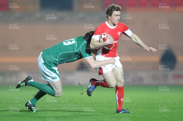 20.03.09 - Wales Under 20 v Ireland Under 20 - Under 20 Six Nations 2009 - Wales' James Loxton tries to get past Eamonn Sheridan. 