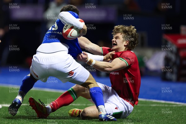 150324 - Wales U20 v Italy U20, U20 6 Nations - Aidan Boshoff of Wales tackles Mirko Belloni of Italy