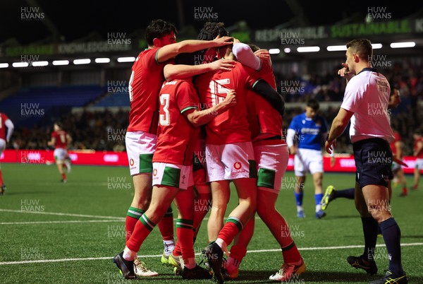 150324 - Wales U20 v Italy U20, U20 6 Nations - Matty Young of Wales celebrates after he dives in to score try