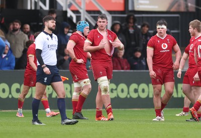 150326 - Wales v Italy, U20 Six Nations 2026 - Luke Evans of Wales ends up with a ripped shirt after the teams square up to one another
