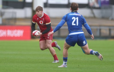 150326 - Wales v Italy, U20 Six Nations 2026 - Steffan Emanuel of Wales takes on Alessandro Teodosio of Italy
