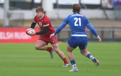 150326 - Wales v Italy, U20 Six Nations 2026 - Steffan Emanuel of Wales takes on Alessandro Teodosio of Italy