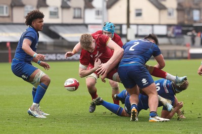150326 - Wales v Italy, U20 Six Nations 2026 - Osian Williams of Wales loses the ball as he is tackled