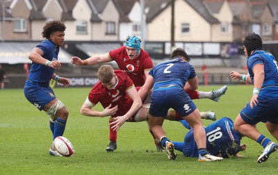 150326 - Wales v Italy, U20 Six Nations 2026 - Osian Williams of Wales loses the ball as he is tackled