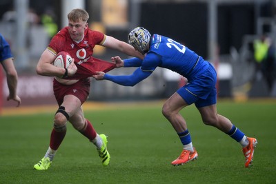 150326 - Wales U20 v Italy U20 - U20 Six Nations Championship - Lewis Edwards of Wales is challenged by Giovanni Degli Antoni of italy