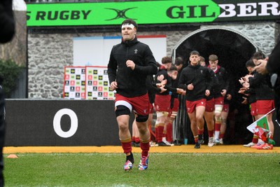 150326 - Wales U20 v Italy U20 - U20 Six Nations Championship - Deian Gwynne of Wales runs out at the start of the match