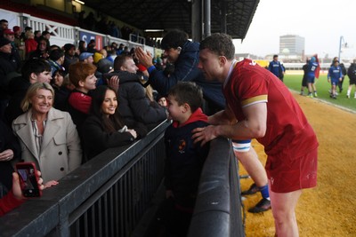 150326 - Wales U20 v Italy U20 - U20 Six Nations Championship - Tom Bowen of Wales with fans at full time