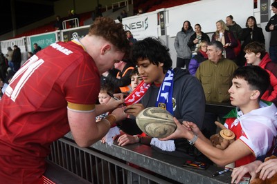 150326 - Wales U20 v Italy U20 - U20 Six Nations Championship - Osian Williams of Wales with fans at full time