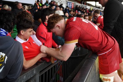 150326 - Wales U20 v Italy U20 - U20 Six Nations Championship - Osian Williams of Wales with fans at full time