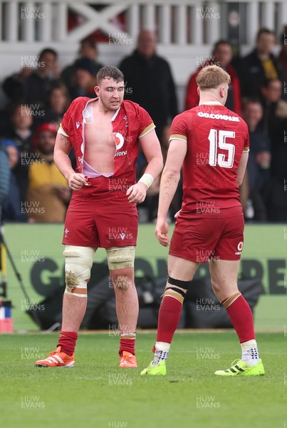 150326 - Wales v Italy, U20 Six Nations 2026 - Luke Evans of Wales ends up with a ripped shirt after the teams square up to one another