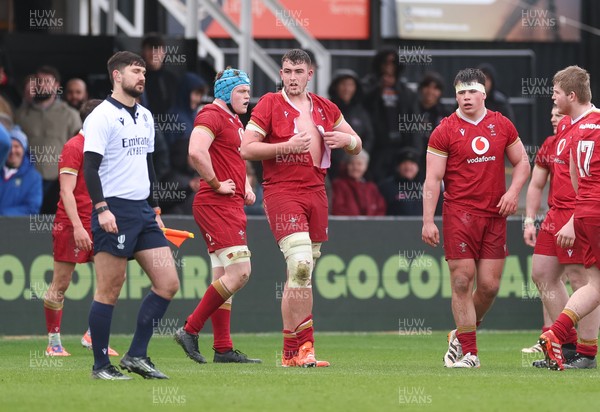 150326 - Wales v Italy, U20 Six Nations 2026 - Luke Evans of Wales ends up with a ripped shirt after the teams square up to one another