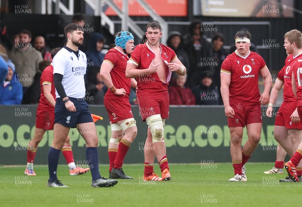 150326 - Wales v Italy, U20 Six Nations 2026 - Luke Evans of Wales ends up with a ripped shirt after the teams square up to one another