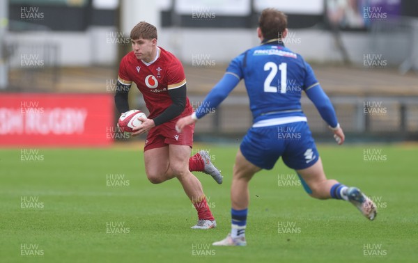 150326 - Wales v Italy, U20 Six Nations 2026 - Steffan Emanuel of Wales takes on Alessandro Teodosio of Italy