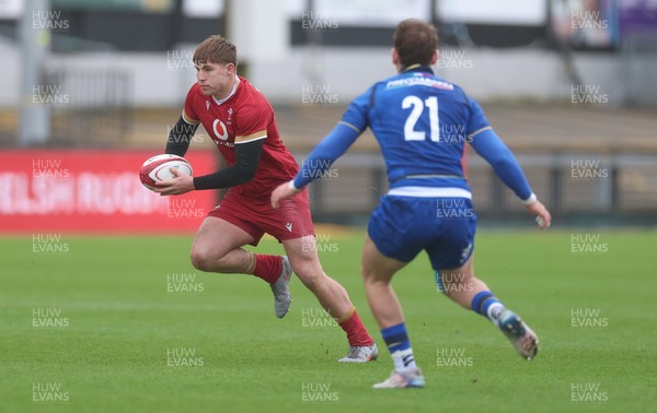 150326 - Wales v Italy, U20 Six Nations 2026 - Steffan Emanuel of Wales takes on Alessandro Teodosio of Italy