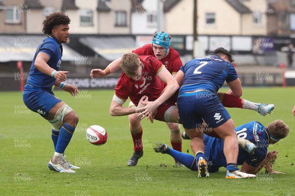 150326 - Wales v Italy, U20 Six Nations 2026 - Osian Williams of Wales loses the ball as he is tackled