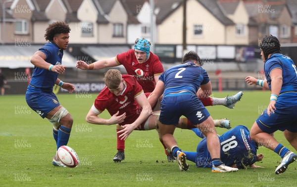 150326 - Wales v Italy, U20 Six Nations 2026 - Osian Williams of Wales loses the ball as he is tackled