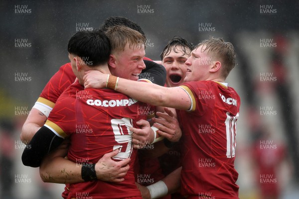 150326 - Wales U20 v Italy U20 - U20 Six Nations Championship - Lewis Edwards of Wales celebrates scoring a try with team mates