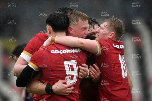 150326 - Wales U20 v Italy U20 - U20 Six Nations Championship - Lewis Edwards of Wales celebrates scoring a try with team mates