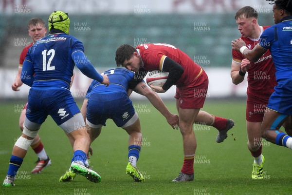 150326 - Wales U20 v Italy U20 - U20 Six Nations Championship - Steffan Emanuel of Wales is challenged by Luca De Novellis of italy