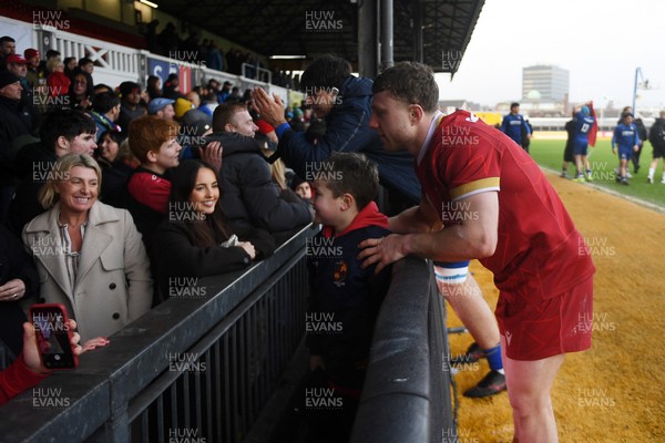 150326 - Wales U20 v Italy U20 - U20 Six Nations Championship - Tom Bowen of Wales with fans at full time