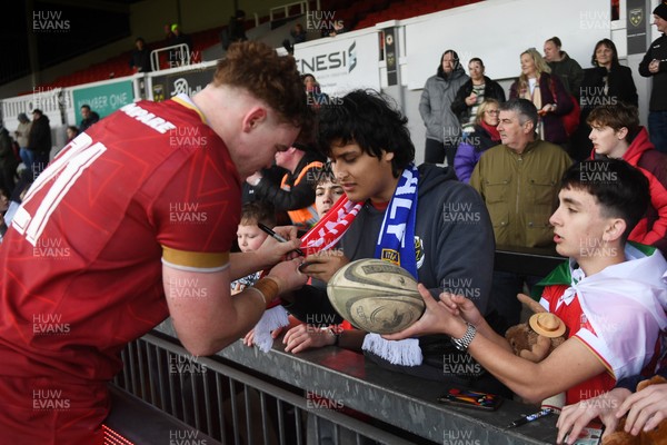 150326 - Wales U20 v Italy U20 - U20 Six Nations Championship - Osian Williams of Wales with fans at full time