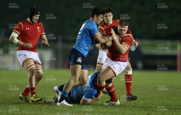 180316 - Wales U20 v Italy U20 - RBS 6 Nations - Corey Domachowski of Wales is tackled by Leonard Krumov and Marco Zanon of Italy