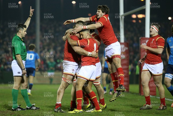 180316 - Wales U20 v Italy U20 - RBS 6 Nations - Harrison Keddie of Wales celebrates scoring a try with team mates