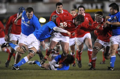 22.02.08 - Wales Under 20 v Italy Under 20 - Under 20 Six Nations - Wales' Ryan Prosser is held by the Italian defence 